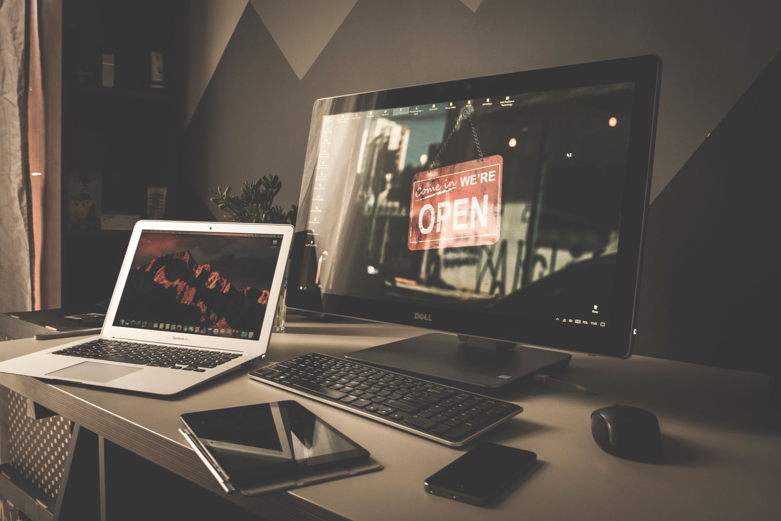 Organized computer workspace setup with monitor and accessories